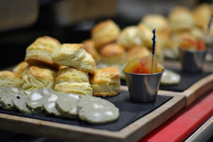 Freshly baked biscuits and mortadella.
